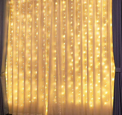 Fairy light curtain jaal used as decorative lighting for a party backdrop.