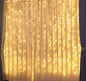 Fairy light curtain jaal used as decorative lighting for a party backdrop.
