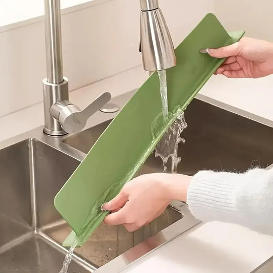 Silicone sink splash mat designed to help catch water around faucets