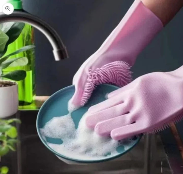 Reusable silicone dishwashing gloves with built-in scrubbing bristles for kitchen cleaning.