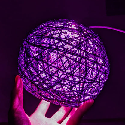Close-up view of the string ball lamp showing its decorative construction and details.