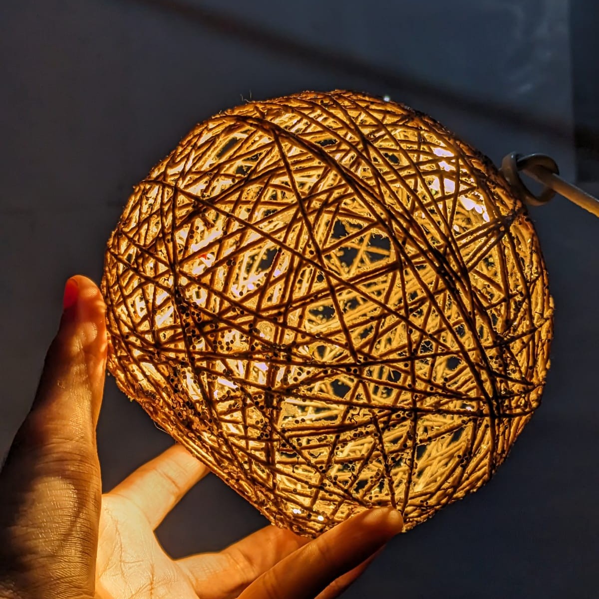 String ball lamp for decorative home lighting and everyday interior decoration.